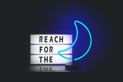 Reach for the moon sign